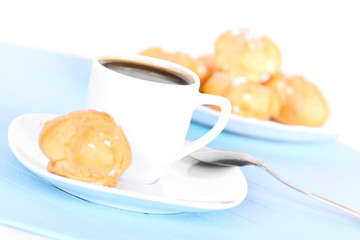 Cup of coffee on blue mat