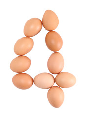 Number four made of Eggs. Isolated on white.