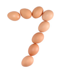 Number seven made of Eggs. Isolated on white.