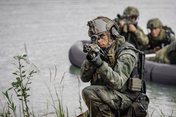 Portrait of a ranger in the battlefield with a gun