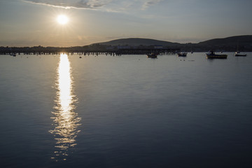 evening sun over bay