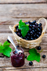 blackcurrant jam. style rustic. selective focus.