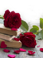 love and memory, old books with red roses