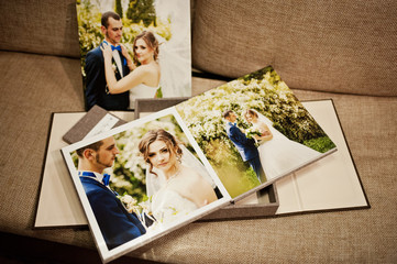 gray and brown textile velvet wedding book and album with pictur - obrazy, fototapety, plakaty