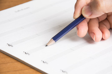 hand writing on notebook