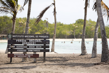 Wood sign to the paradise beach, Venezuela