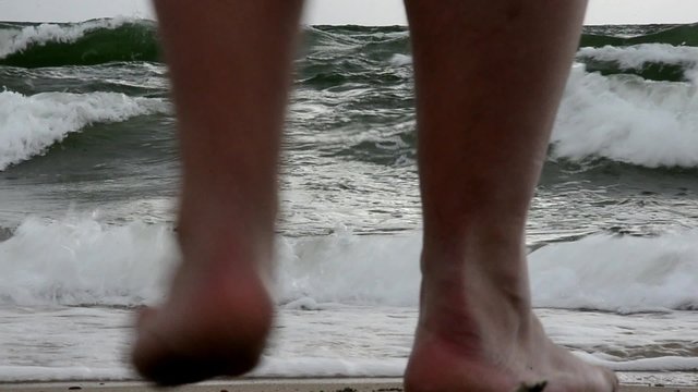 Big waves on the beach of the Curonian Spit. Storm on the sea.
