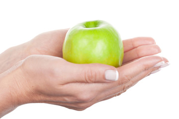 Green apple in hands