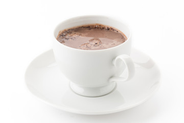 a cup of chocolate on white