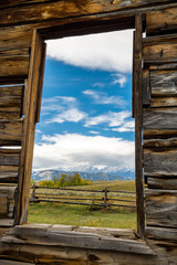 View of the Tetons Through a Cabin Window