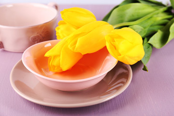 Table setting with flowers, closeup