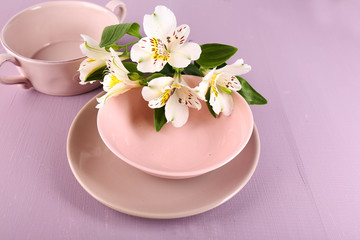 Fototapeta na wymiar Table setting with flowers, closeup