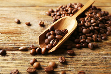 Coffee beans on wooden background