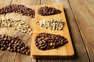 Coffee beans on wooden background