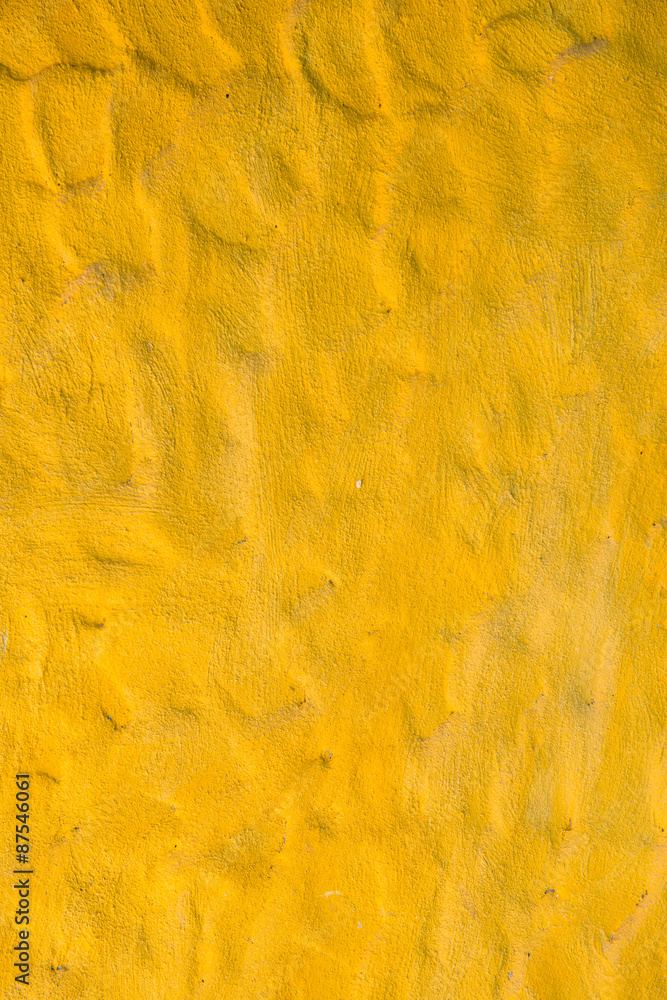 Wall mural Background of yellow concrete wall