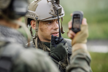 officer holds a radio station, and give orders subdivision