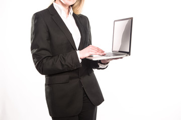 Business woman using laptop isolated on white background