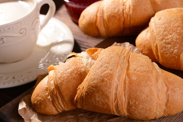 Delicious croissants on table close-up