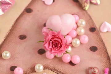 Fototapeta na wymiar Pink Roses and Rose Soap Heart (Spa aromatherapy).