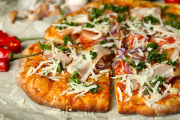 Tasty pizza with vegetables on table close up