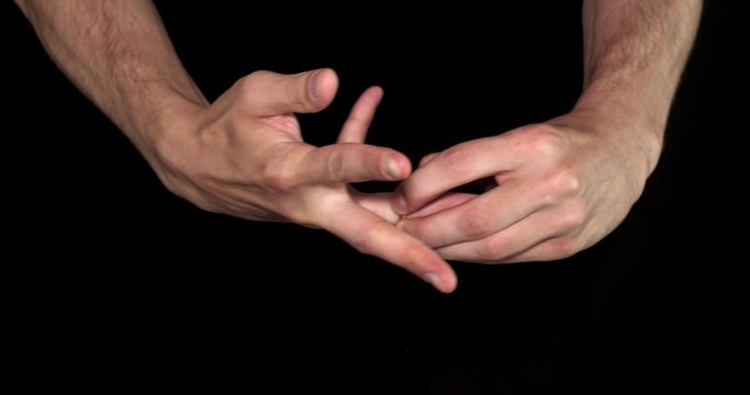 Hands takes off a ring