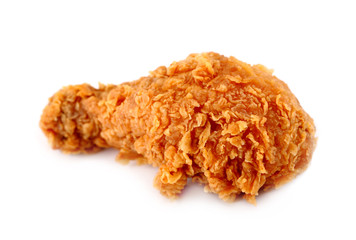Golden brown fried chicken drumsticks on white background
