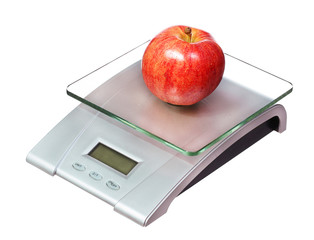 food scale with apple isolated on white background