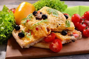 Delicious homemade pizza on table close-up