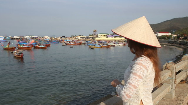blonde girl in vietnamese has nice time in fishing village