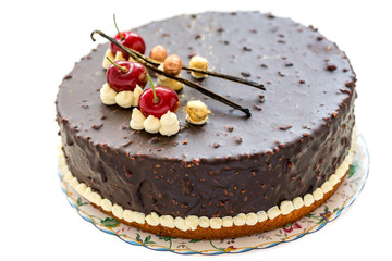 Cake with a cherry and vanilla.