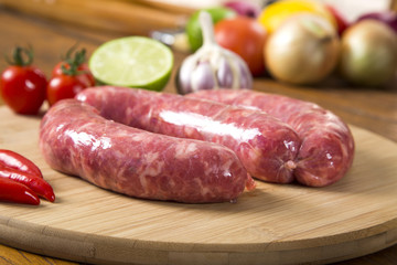 Sausage raw on the board