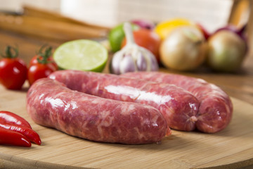 Sausage raw on the board