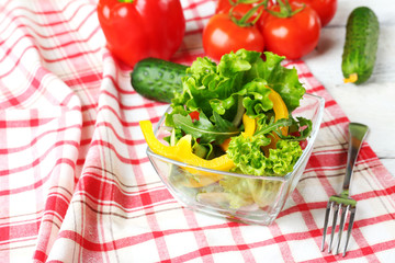 fresh vegetable salad in bowl on table close up