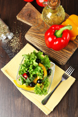 fresh vegetable salad in bowl on table close up