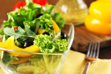 fresh vegetable salad in bowl on table close up