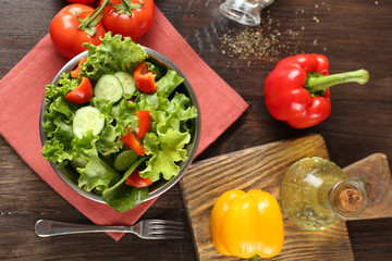 fresh vegetable salad in bowl on table close up