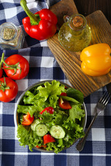 fresh vegetable salad in bowl on table close up