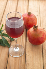 Shallow focus of organic Pomegranate Juice healthy drink