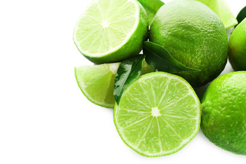 Fototapeta na wymiar Sliced fresh limes isolated on white