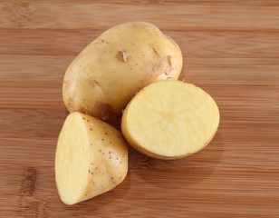 potato over wooden background