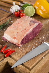 Organic Red Raw Steak Sirloin on wooden board