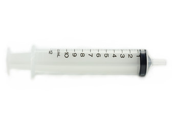 Large feeding syringe isolated on a white background