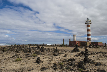 Lighthouse by the sea © marko