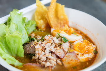 Thai noodle soup in a bowl taste spicy noodle soup.