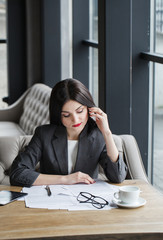 Pretty business lady having a conversation with a client concern