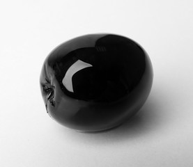 Black olive isolated on white