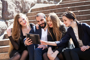 Group of Friends with Tablet PC