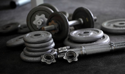 Obraz na płótnie Canvas exercise weights - iron dumbbell.