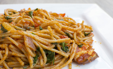Vegan spaghetti with tofu and pepper delicious on plate