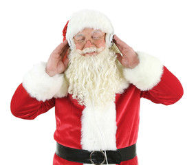 Santa Claus with headphones listening to music, isolated on white background